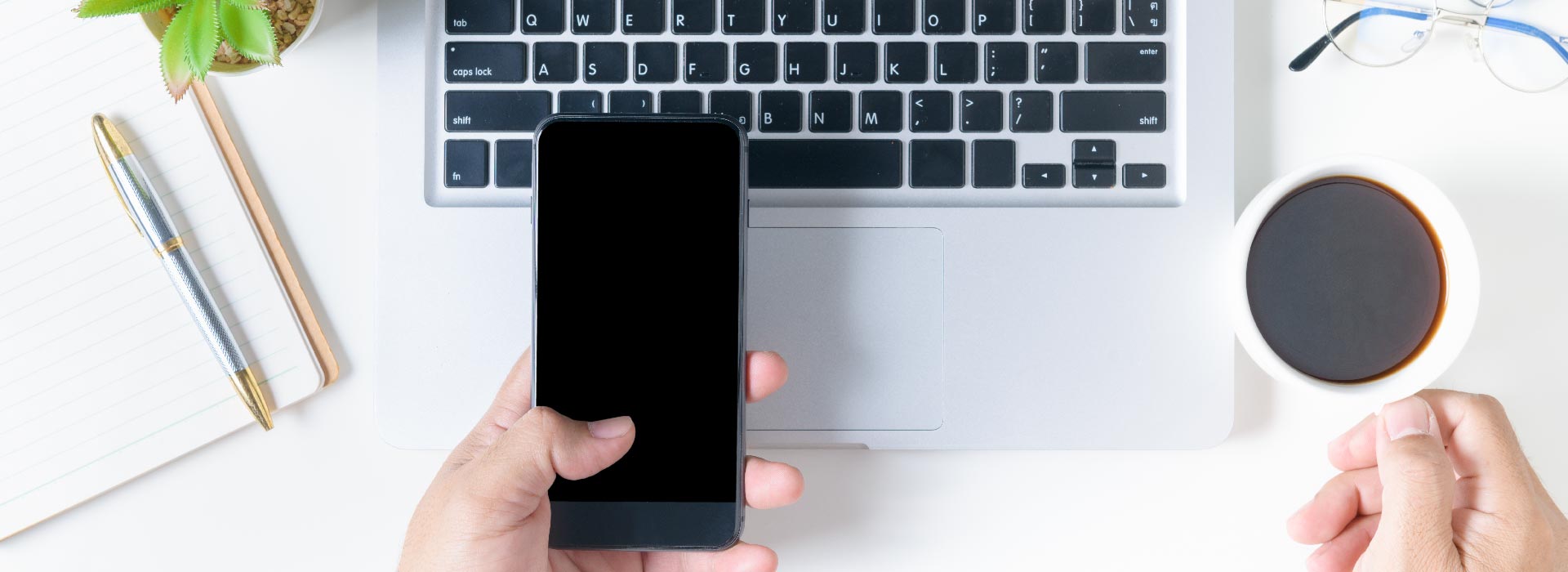 man on laptop with coffee